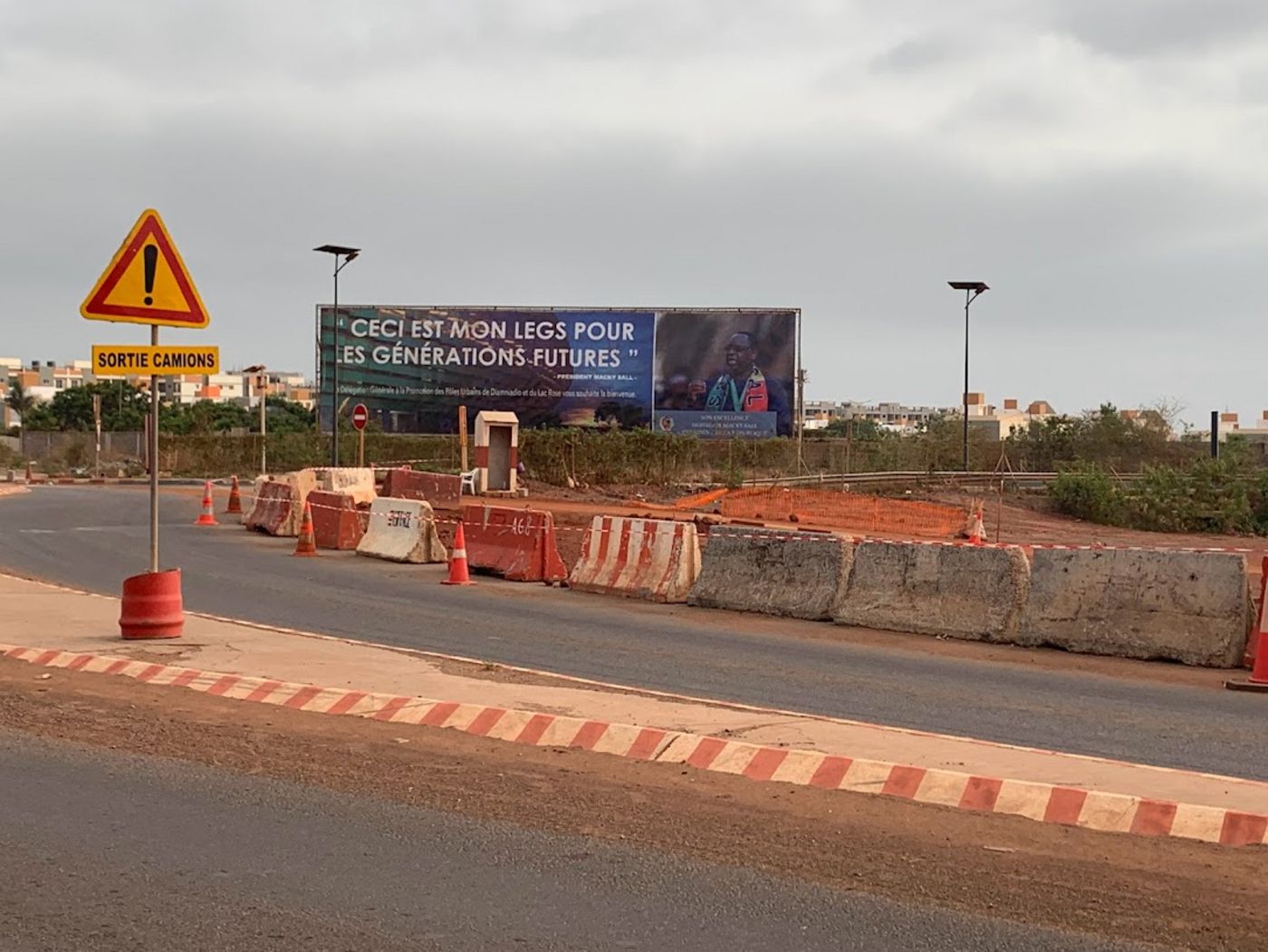 Banner in the UHD showing President Macky Sall and his slogan "This is my legacy for future generations".