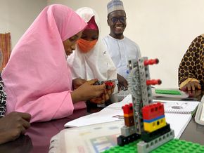 Teenage girls in northern Nigeria assemble Legos during a STEM class. 