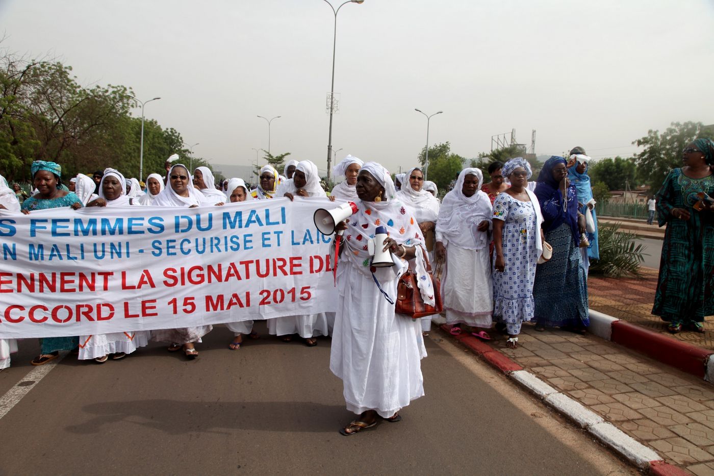 Bamako, 2015: Women rally for the Algiers Peace Agreement. They have gone from marginal representation during that time to joining the process at Track I level in 2020.