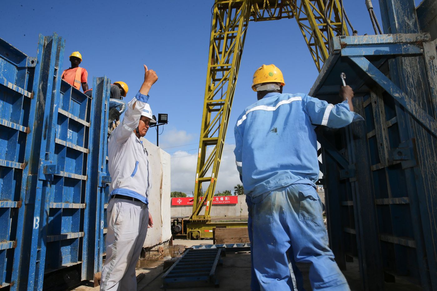 Chinese and Kenyan workers at Lamu Port Project construction site in 2017.