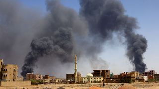Khartoum North, Sudan, May 1, 2023: Smoke billows from buildings after aerial bombardments. 