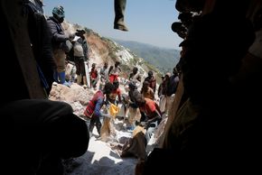 Congo, 2019: Miners work at the entrance to a shaft at the Société Minière de Bisunzu (SMB) coltan mine near the town of Rubaya in the east of the country.