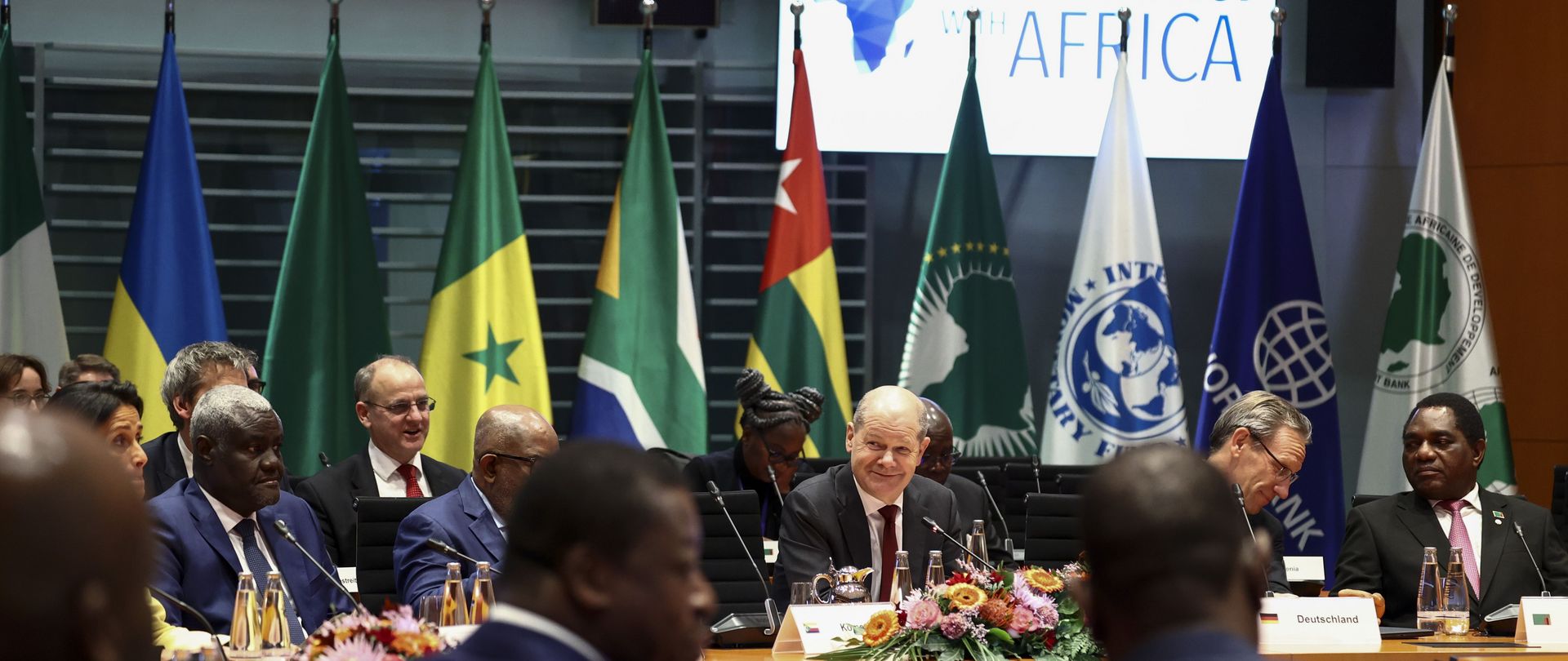 German Chancellor Olaf Scholz presides over the 2023 "Compact with Africa" investment summit in Berlin. 