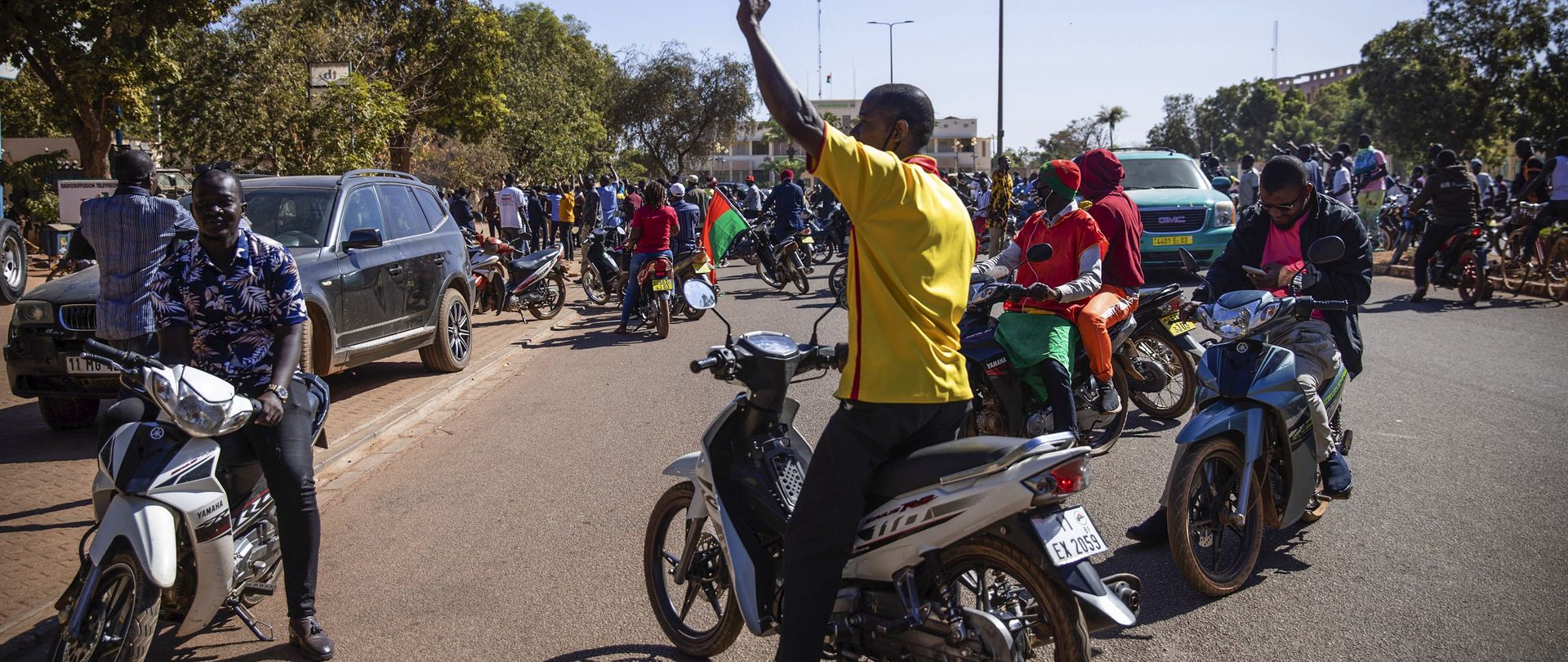 People cheering of putchist soldiers on the streets of Ouagadougou, Burkina Faso.