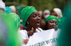 Abuja, March 8, 2022: A woman marches to protest against legislative bias against women on International Women