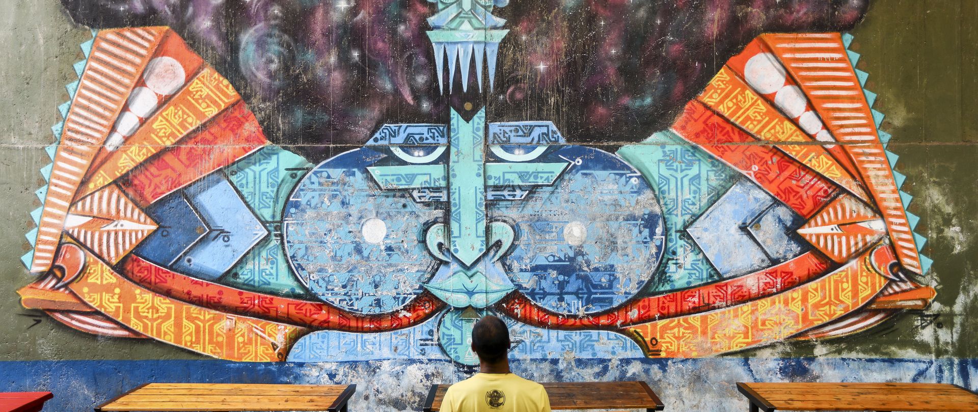 Kenyan graffiti artist Bhupi Jethwa has left his colourful mark on numerous walls, sharing his vision through large-scale paintings. 